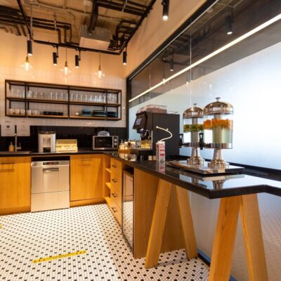 A kitchen with black and white checkered floors.